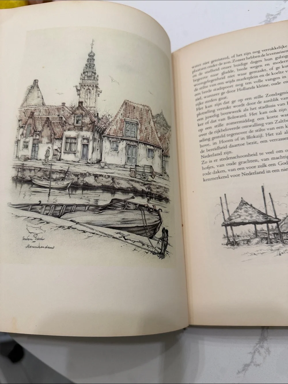 Dutch Blue Hardcover Book with Gold Fisherman Illustration